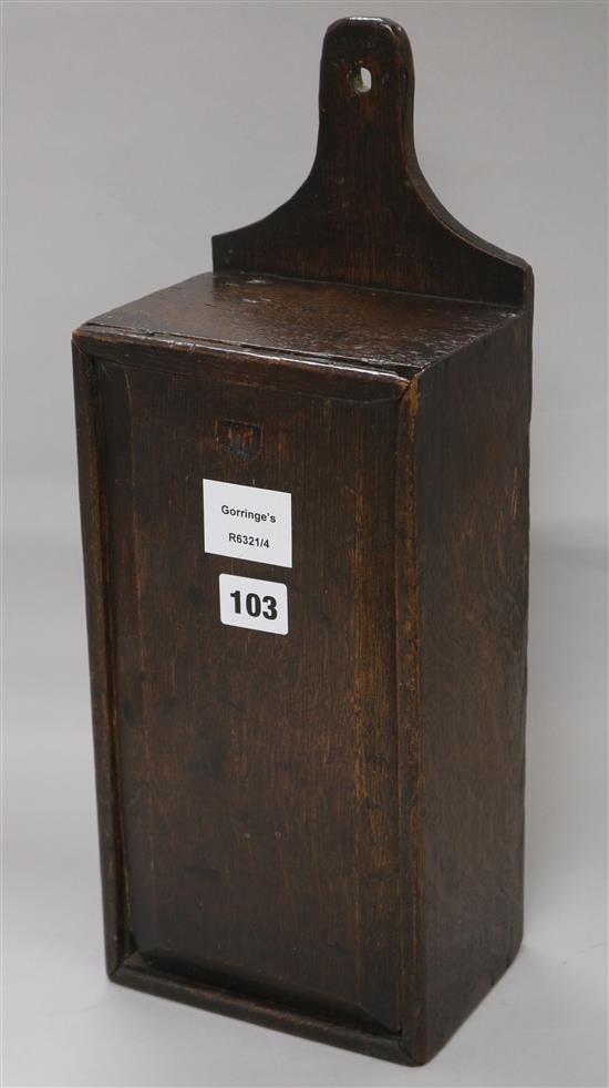 A late 18th century oak candle box height 40cm